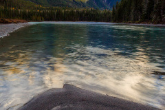 Mountain River in the Canadian Rocky Mountains, British Columbia, Canada in later afternoon light.