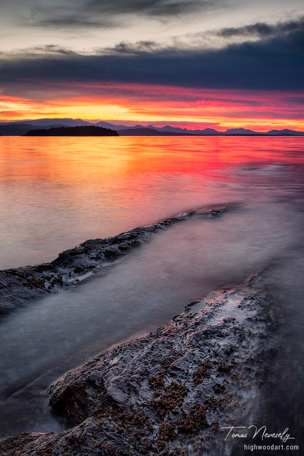 Rainstorm at sunset at Montague Harbour Marine Provincial Park on Galiano Island in the Gulf Islands, British Columbia, Canada