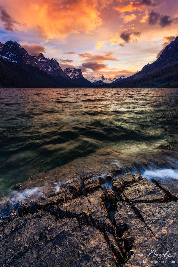 Sunset on the shore of St Mary Lake along the Going to the Sun Road in Glacier National Park, Montana, USA