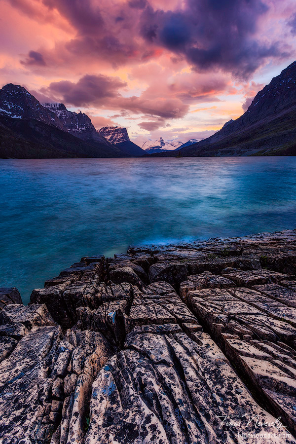Sunset on the shore of St Mary Lake along the Going to the Sun Road in Glacier National Park, Montana, USA